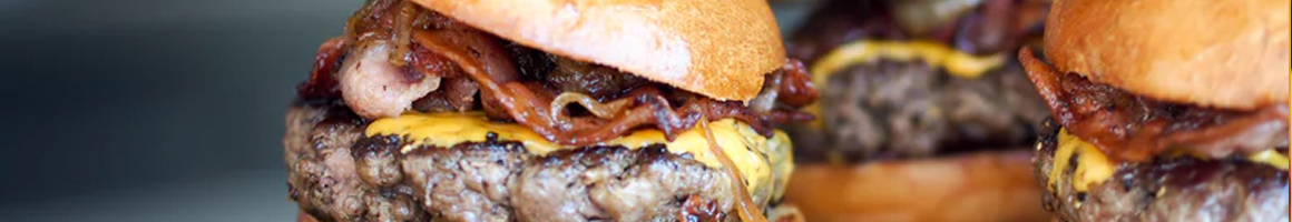 Eating Burger at Big Tomy's restaurant in Culver City, CA.